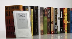 Kindle-ebook-next-to-row-of-books